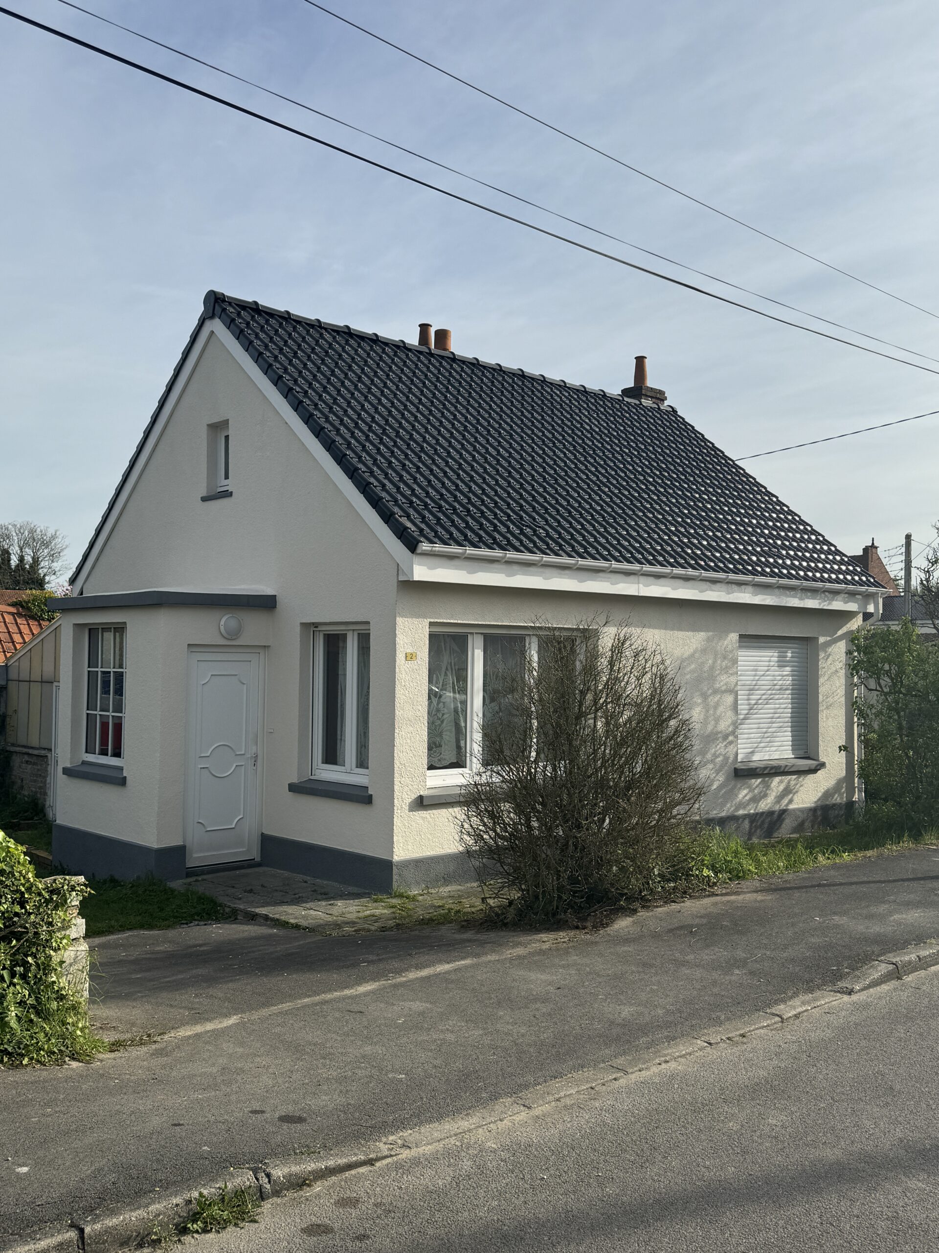 Rénovation de toiture en tuiles noires à Dunkerque