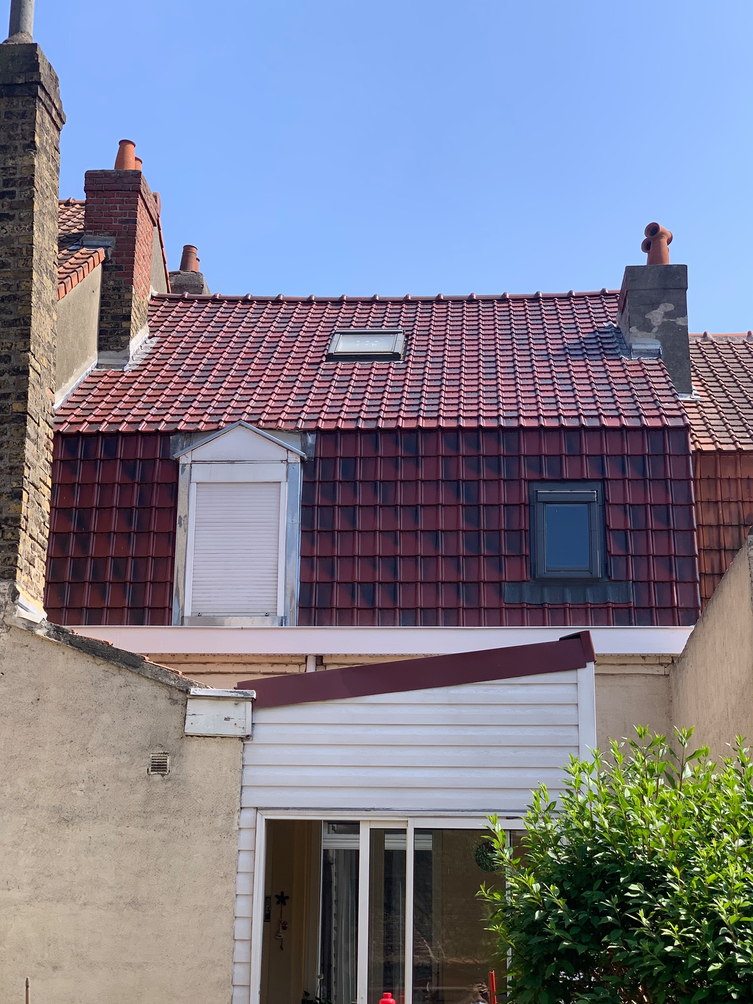 Rénovation de toiture en tuiles rouges à Dunkerque